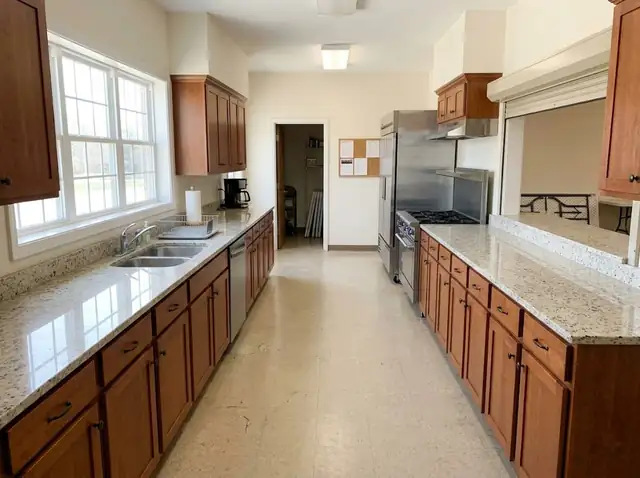 Illustration of a fellowship hall kitchen with long runs of light granite countertops